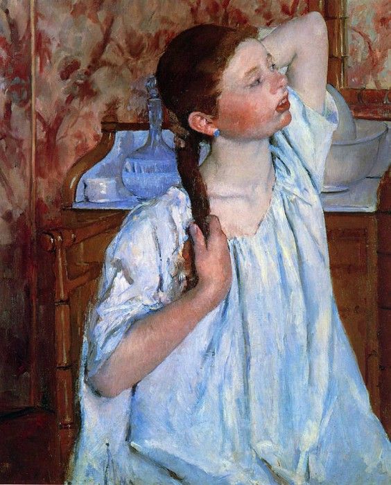 Girl Arranging Her Hair.  