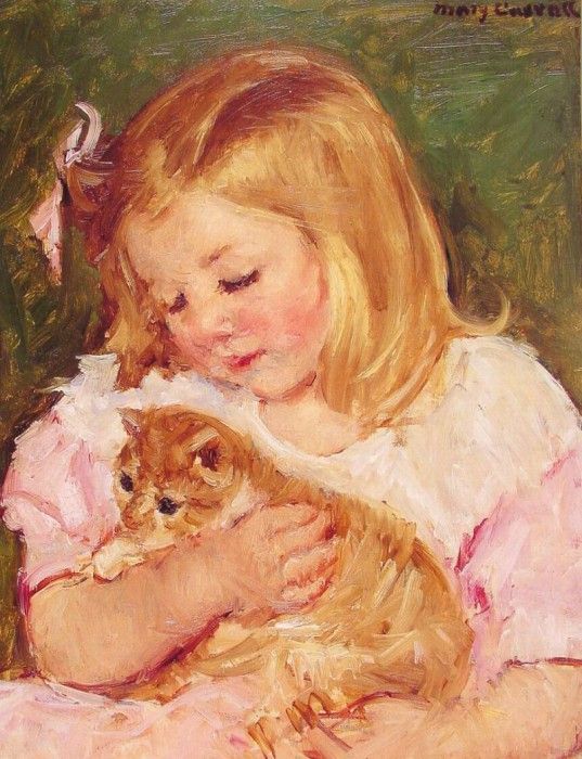 Sara Holding A Cat.  